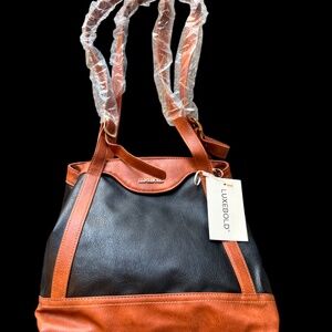 Luxebold -  Purse.  Brand new with dust bag.  Black and tan.